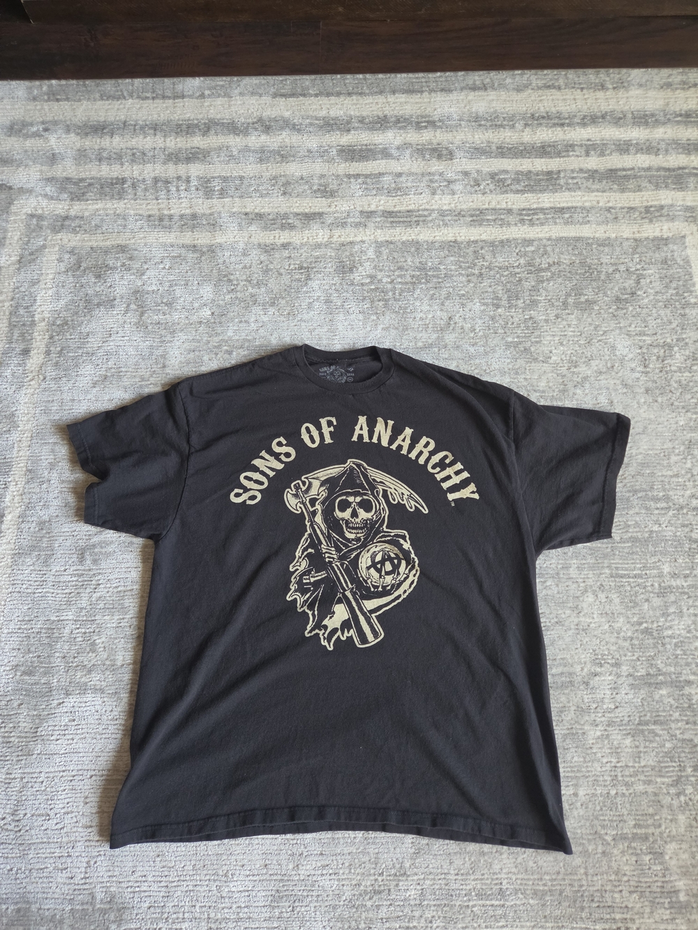 Black Graphic Tee - Iconic Skull Emblem